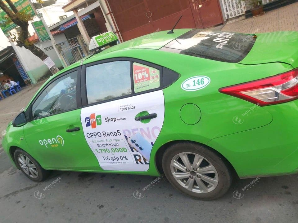 FPT Shop quảng cáo trên xe taxi Open99