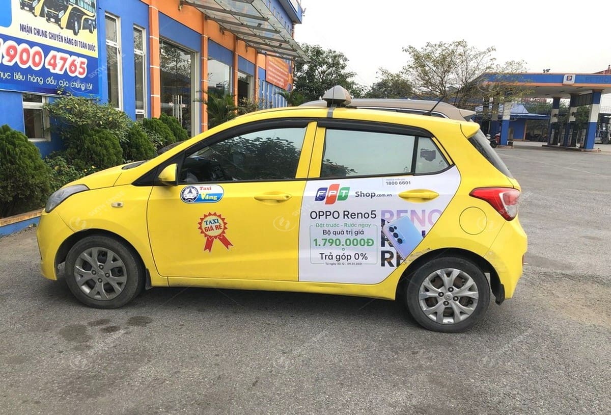 FPT Shop quảng cáo trên xe taxi Vàng Nam Định