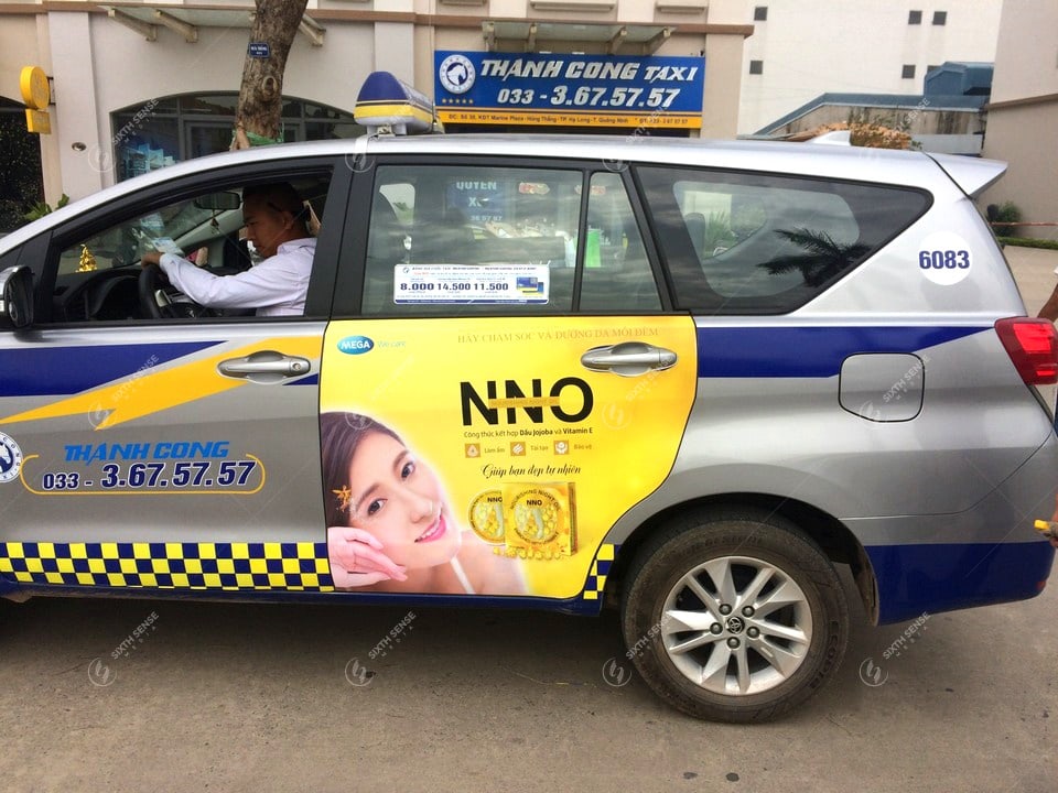 Mega Wecare quảng cáo trên xe taxi năm 2017