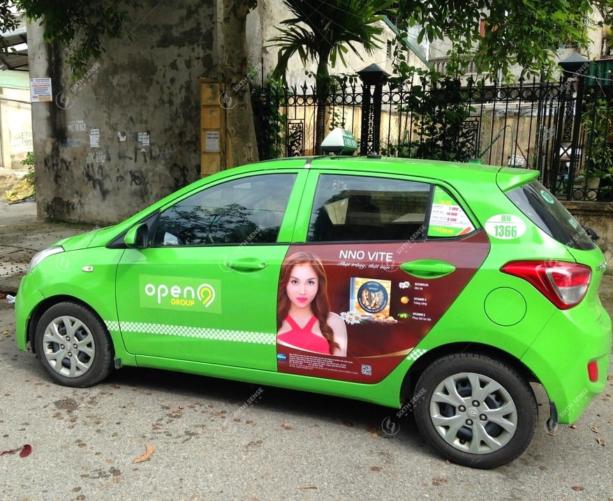 Mega Wecare quảng cáo trên xe taxi năm 2017