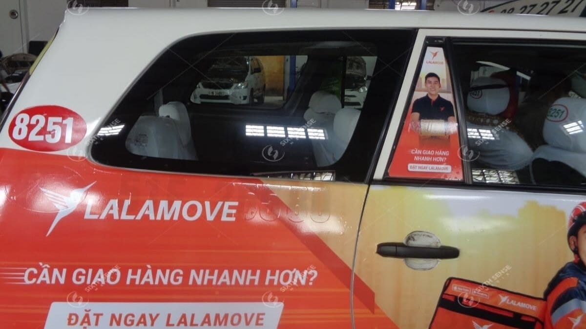 Dán Quảng Cáo Trên Kính Xe Taxi