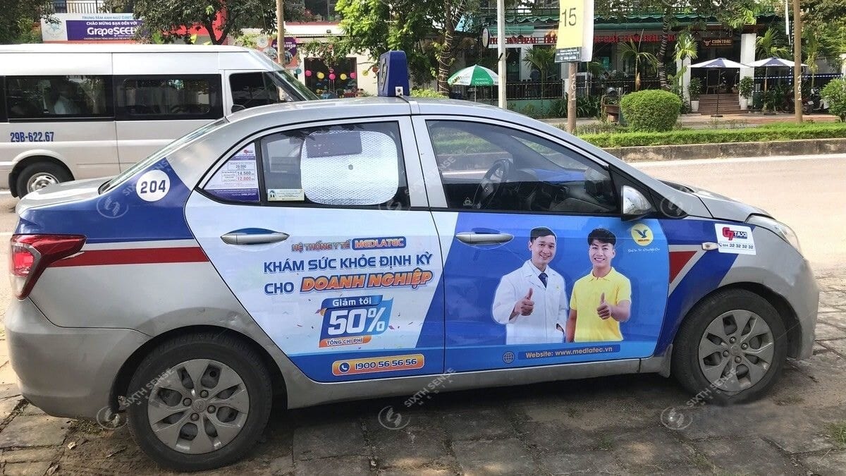 Dán Quảng Cáo Trên Taxi Là Gì?