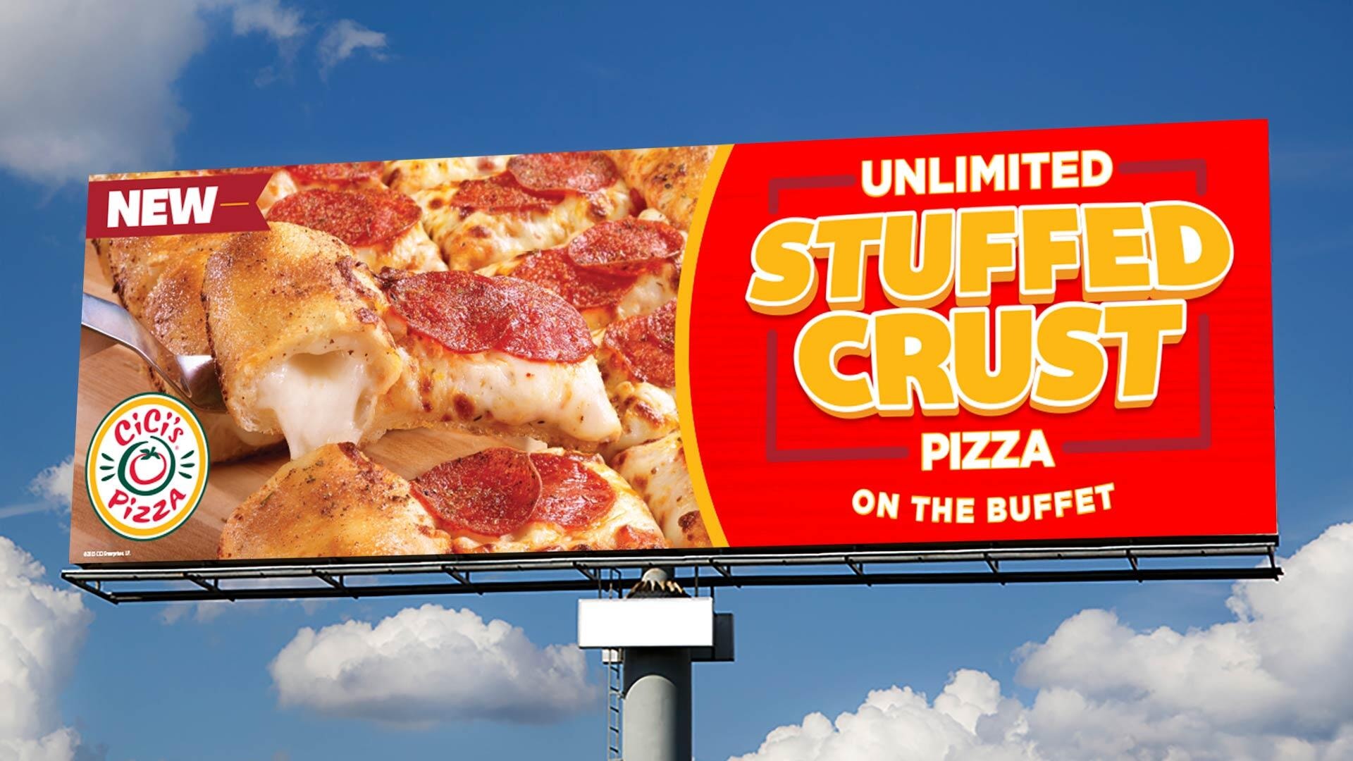 #9. Biển quảng cáo của Cicis Pizza với hình pizza viền phô mai kéo sợi hấp dẫn, nổi bật dòng chữ “Unlimited Stuffed Crust Pizza on the Buffet” trên nền đỏ rực.